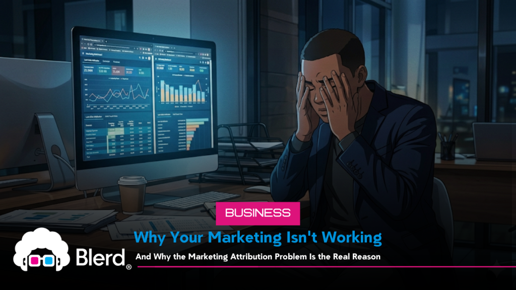 Why Your Marketing Isn't Working And Why the Marketing Attribution Problem Is the Real Reason 131 A Black male business owner sits at his desk with his head in his hands, stressed and overwhelmed by marketing dashboards showing charts and ad spend reports on his monitor — the marketing attribution problem visualized